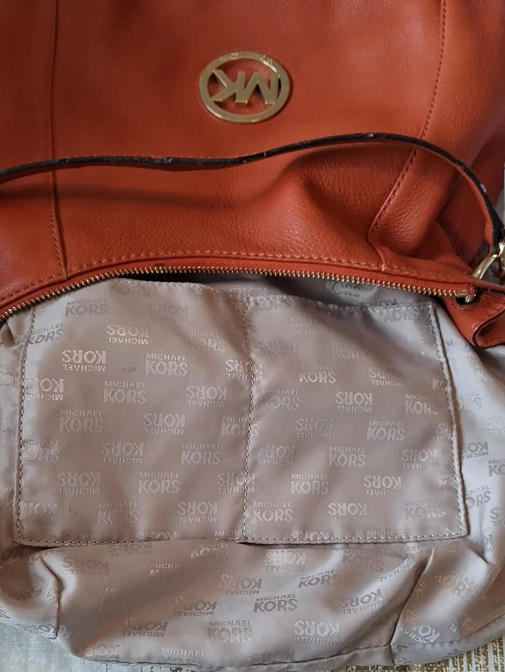 Michael Kors Orange Pebbled Leather Convertible Hobo Bag